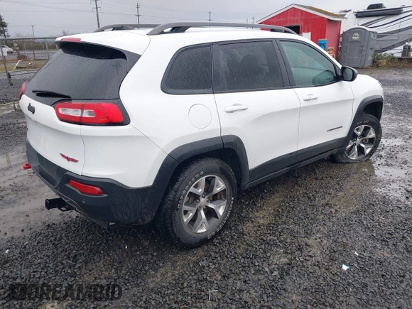 2018 Jeep Cherokee Trailhawk with VIN 1C4PJMBBXJD567022, listed as a IAAI auction lot 41834618 with 41,017 mi miles and . Bid and sale history available at DreamBid. Image 4.