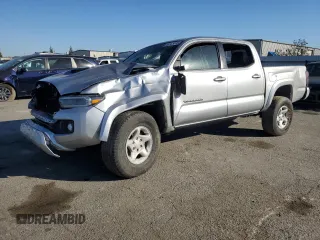 2023 Toyota Tacoma SR with VIN 3TMCZ5AN0PM538974, listed as a Copart auction lot 89165095 with 31,281 mi miles and Salvage title. Bid and sale history available at DreamBid. Image 1.