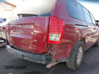 2012 Kia Sedona LX with VIN KNDMG4C70C6443649, listed as a IAAI auction lot 41662007 with 208,575 mi miles. Bid and sale history available at carsss.com. Image 6.