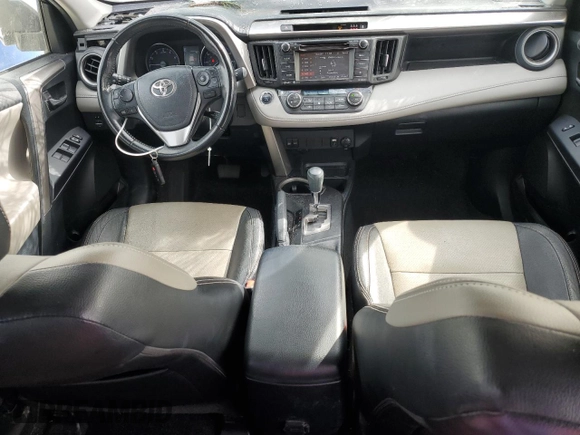2018 Toyota RAV4 XLE with VIN JTMWFREV6JJ735000, listed as a Copart auction lot 45869275 with 113,675 mi miles and Salvage Title. Bid and sale history available at DreamBid. Image 8.
