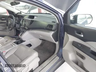 2013 Honda CR-V LX with VIN 3CZRM3H38DG708049, listed as a IAAI auction lot 42558031 with 183,542 mi miles and . Bid and sale history available at DreamBid. Image 5.