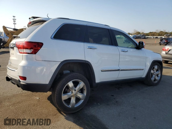 2013 Jeep Grand Cherokee Overland with VIN 1C4RJFCG8DC639408, listed as a Copart auction lot 77910444 with 89,623 mi miles and Salvage Title. Bid and sale history available at carsss.com. Image 3.