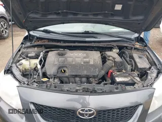 2010 Toyota Corolla with VIN 2T1BU4EEXAC418520, listed as a IAAI auction lot 42491049 with 104,218 mi miles and . Bid and sale history available at DreamBid. Image 10.