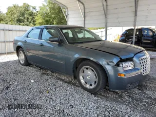 2005 Chrysler 300 Touring z VIN 2C3JA53G65H574021, wystawiony jako Copart lot #70073414 z przebiegiem 291 219 mil mil oraz Szkoda całkowita • Salvage title. Historia ofert i sprzedaży dostępna na DreamBid. Obrazek 4.