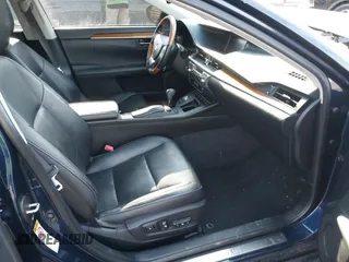 2014 Lexus ES 300h with VIN JTHBW1GG7E2071500, listed as a IAAI auction lot 41676321 with 64,217 mi miles and . Bid and sale history available at DreamBid. Image 5.