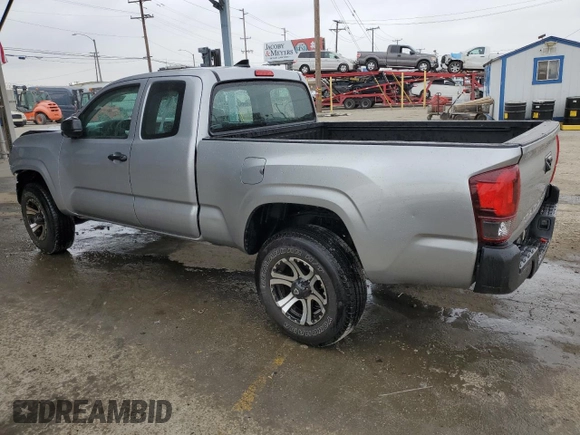 2018 Toyota Tacoma SR with VIN 5TFRX5GN1JX124112, listed as a Copart auction lot 50596975 with 57,587 mi miles and Salvage Title. Bid and sale history available at DreamBid. Image 2.