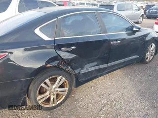 2015 Nissan Altima SL z VIN 1N4BL3AP5FC181624, wystawiony jako IAAI lot #41638335 z przebiegiem 104 396 mil mil oraz . Historia ofert i sprzedaży dostępna na DreamBid. Obrazek 6.