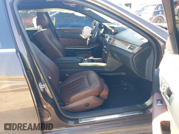 2014 Mercedes-Benz E 550 Sport with VIN WDDHF9BB5EA971894, listed as a IAAI auction lot 41405571 with 113,363 mi miles and . Bid and sale history available at DreamBid. Image 5.
