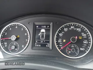 2016 Volkswagen Tiguan S with VIN WVGBV7AX9GW566451, listed as a IAAI auction lot 41393999 with 51,616 mi miles and . Bid and sale history available at DreamBid. Image 7.