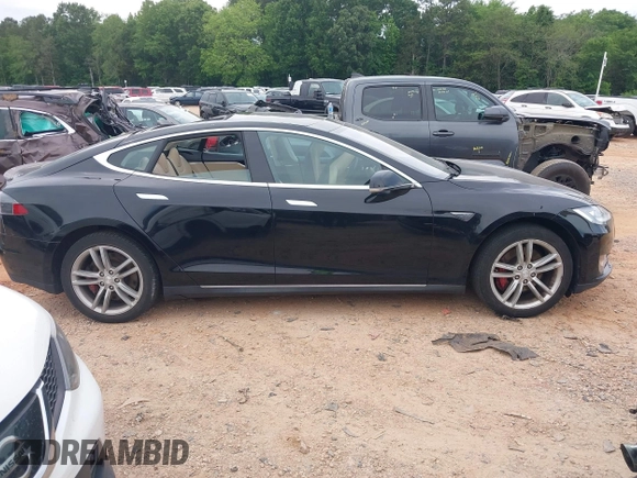 2014 Tesla Model S 60 with VIN 5YJSA1H10EFP34137, listed as a IAAI auction lot 42311565 with Not provided miles and . Bid and sale history available at DreamBid. Image 12.