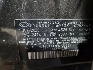 2023 Genesis G70 2.0T with VIN KMTG34TA1PU131167, listed as a Copart auction lot 80670154 with 27,980 mi miles and Clean Title. Bid and sale history available at DreamBid. Image 12.