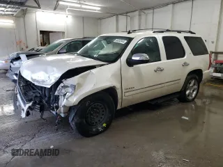 2012 Chevrolet Tahoe LTZ z VIN 1GNSCCE01CR290816, wystawiony jako Copart lot #86832044 z przebiegiem 156 449 mil mil oraz Szkoda całkowita • Salvage title. Historia ofert i sprzedaży dostępna na DreamBid. Obrazek 1.