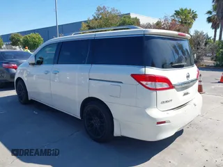 2014 Nissan Quest S with VIN JN8AE2KP7E9107596, listed as a IAAI auction lot 42745979 with 180,780 mi miles and . Bid and sale history available at DreamBid. Image 3.