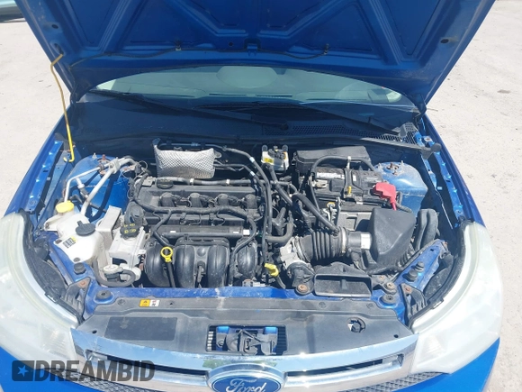 2011 Ford Focus SE with VIN 1FAHP3FN2BW111187, listed as a IAAI auction lot 42003148 with 119,083 mi miles. Bid and sale history available at carsss.com. Image 10.