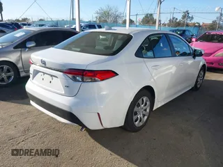 2022 Toyota Corolla LE with VIN 5YFEPMAE3NP276964, listed as a IAAI auction lot 41714701 with 63,597 mi miles. Bid and sale history available at carsss.com. Image 4.