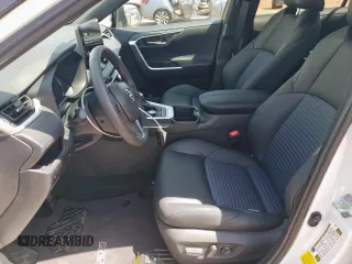 2023 Toyota RAV4 Hybrid XSE with VIN 2T3E6RFV5PW043640, listed as a Copart auction lot 64097125 with 13,686 mi miles and Salvage title. Bid and sale history available at DreamBid. Image 7.