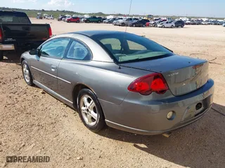 2003 Dodge Stratus SE with VIN 4B3AG42GX3E080447, listed as a IAAI auction lot 40287994 with 199,117 mi miles. Bid and sale history available at carsss.com. Image 3.