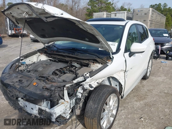 2014 Mazda CX-5 Grand Touring with VIN JM3KE4DY0E0343777, listed as a IAAI auction lot 41464395 with 126,214 mi miles. Bid and sale history available at carsss.com. Image 6.