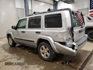 2006 Jeep Commander with VIN 1J8HG48N86C275203, listed as a Copart auction lot 57827085 with 197,552 mi miles and Clean title. Bid and sale history available at DreamBid. Image 2.