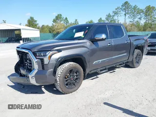2022 Toyota Tundra 1794 Edition with VIN 5TFMA5DB9NX015571, listed as a IAAI auction lot 41730283 with 76,429 mi miles and . Bid and sale history available at DreamBid. Image 2.