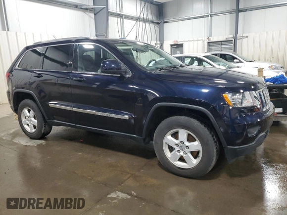2011 Jeep Grand Cherokee Laredo with VIN 1J4RR4GG9BC555662, listed as a Copart auction lot 52447235 with 151,695 mi miles and Salvage Title. Bid and sale history available at carsss.com. Image 4.