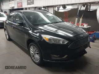 2017 Ford Focus Titanium with VIN 1FADP3N24HL272396, listed as a IAAI auction lot 41852208 with 92,945 mi miles and . Bid and sale history available at carsss.com. Image 1.