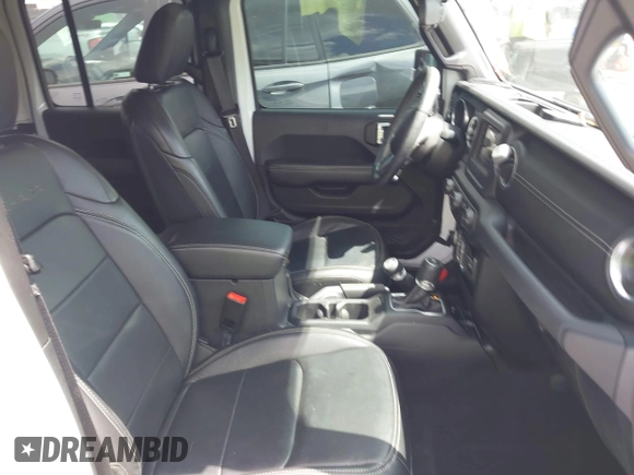 2018 Jeep Wrangler Unlimited Sahara with VIN 1C4HJXEG1JW205789, listed as a IAAI auction lot 42435877 with 57,587 mi miles and . Bid and sale history available at DreamBid. Image 5.
