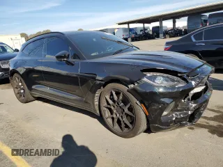 2021 Aston Martin DBX z VIN SCFVUJAWXMTV01292, wystawiony jako Copart lot #83824504 z przebiegiem Nie podano mil oraz Szkody całkowita. Historia ofert i sprzedaży dostępna na DreamBid. Obrazek 4.