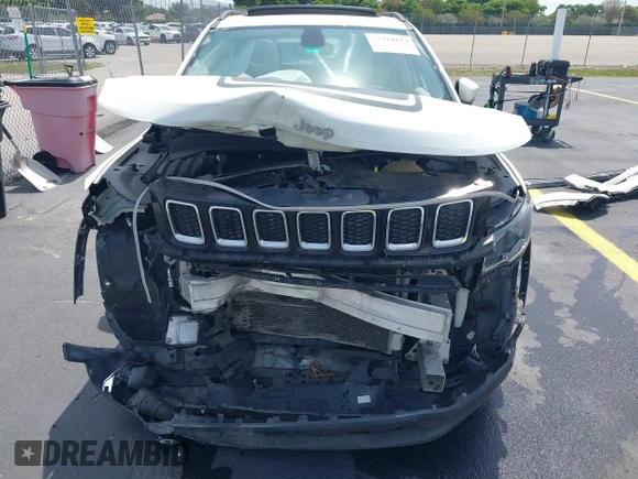 2019 Jeep Compass Latitude with VIN 3C4NJCBB3KT832196, listed as a IAAI auction lot 42210113 with 70,241 mi miles and . Bid and sale history available at DreamBid. Image 13.