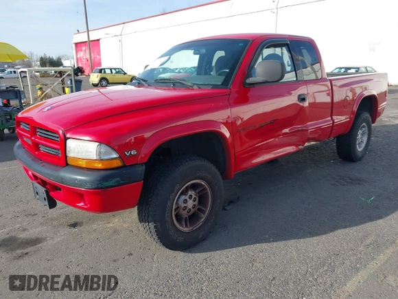 1999 Dodge Dakota SLT with VIN 1B7GG22XXXS290116, listed as a IAAI auction lot 41372636 with 132,112 mi miles and . Bid and sale history available at carsss.com. Image 19.