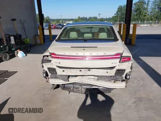 2014 Lincoln MKZ Hybrid с VIN 3LN6L2LU3ER815081, выставлен на аукционе IAAI как лот 42620562 с пробегом 133 377 миль миль и . История ставок и продаж доступна на DreamBid. Изображение 17.