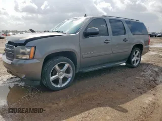 2007 Chevrolet Suburban LT z VIN 1GNFC16J77J341267, wystawiony jako Copart lot #61000625 z przebiegiem Nie podano mil oraz Szkoda całkowita • Salvage title. Historia ofert i sprzedaży dostępna na DreamBid. Obrazek 1.