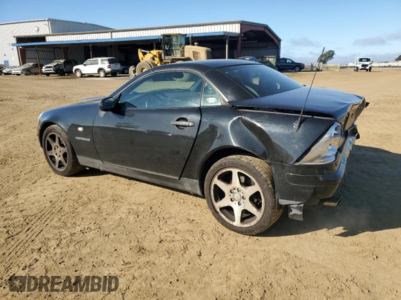 2000 Mercedes-Benz SLK 230 Kompressor with VIN WDBKK47F1YF164000, listed as a Copart auction lot 46366685 with 127,904 mi miles and Salvage title. Bid and sale history available at DreamBid. Image 2.