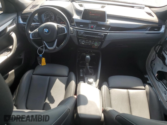 2018 BMW X2 sDrive28i with VIN WBXYJ3C34JEJ84163, listed as a Copart auction lot 54043904 with 46,509 mi miles and Salvage title. Bid and sale history available at DreamBid. Image 8.