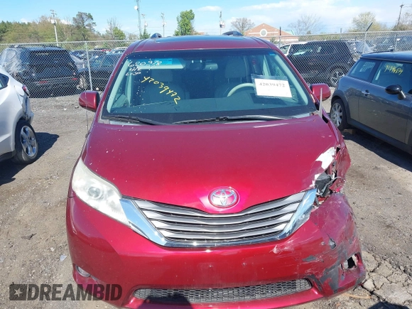 2014 Toyota Sienna XLE with VIN 5TDYK3DC8ES457940, listed as a IAAI auction lot 42039472 with 99,769 mi miles and . Bid and sale history available at DreamBid. Image 12.