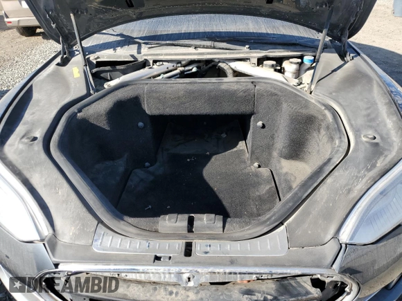 2013 Tesla Model S with VIN 5YJSA1CG9DFP09733, listed as a Copart auction lot 87739005 with 88,163 mi miles and Salvage title. Bid and sale history available at DreamBid. Image 11.