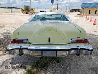 1975 Lincoln Continental z VIN 5Y89A889209, wystawiony jako Copart lot #64262235 z przebiegiem 86 783 mil mil oraz Czysty tytuł • Clean title. Historia ofert i sprzedaży dostępna na DreamBid. Obrazek 6.