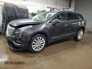 2017 Cadillac XT5 Platinum AWD with VIN 1GYKNFRS5HZ102428, listed as a Copart auction lot 49076295 with 125,556 mi miles and Salvage Title. Bid and sale history available at carsss.com. Image 1.