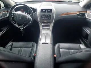 2015 Lincoln MKZ z VIN 3LN6L2G9XFR611837, wystawiony jako Copart lot #55038635 z przebiegiem 133 596 mil mil oraz Szkoda całkowita • Salvage title. Historia ofert i sprzedaży dostępna na DreamBid. Obrazek 8.