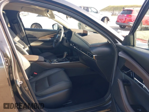 2022 Mazda CX-30 S Premium with VIN 3MVDMBDL0NM413867, listed as a IAAI auction lot 42082560 with 12,375 mi miles and . Bid and sale history available at DreamBid. Image 5.