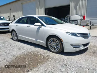 2014 Lincoln MKZ z VIN 3LN6L2GK6ER817934, wystawiony jako IAAI lot #42320672 z przebiegiem 103 710 mil mil oraz . Historia ofert i sprzedaży dostępna na DreamBid. Obrazek 1.