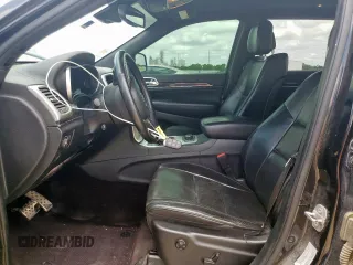 2016 Jeep Grand Cherokee Overland z VIN 1C4RJFCG8GC316271, wystawiony jako Copart lot #57245065 z przebiegiem 125 820 mil mil oraz Szkoda całkowita • Salvage title. Historia ofert i sprzedaży dostępna na DreamBid. Obrazek 7.