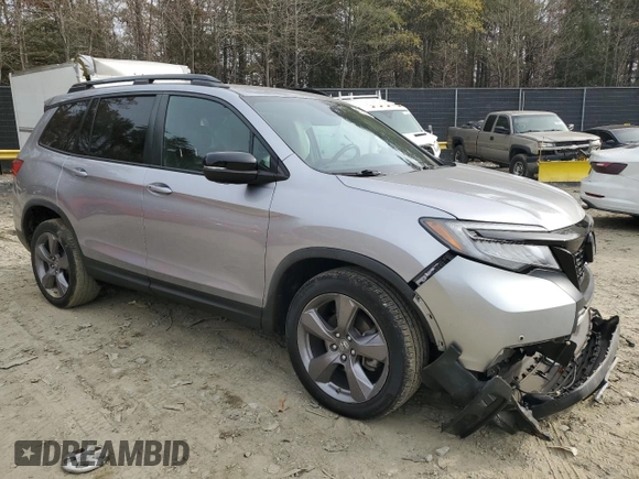 2020 Honda Passport Touring with VIN 5FNYF8H96LB004076, listed as a Copart auction lot 81239214 with 55,787 mi miles and Salvage title. Bid and sale history available at DreamBid. Image 4.
