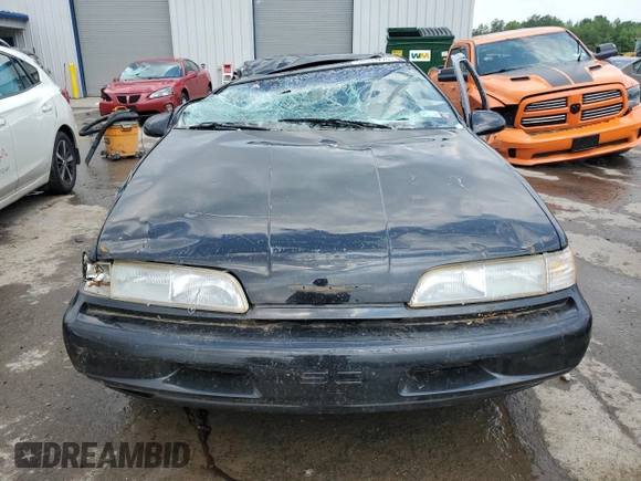 1989 Ford Thunderbird z VIN 1FAPP64R0KH161691, wystawiony jako Copart lot #60097275 z przebiegiem 70 041 mil mil oraz Szkoda całkowita • Salvage title. Historia ofert i sprzedaży dostępna na DreamBid. Obrazek 5.