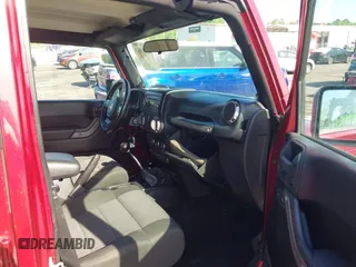 2011 Jeep Wrangler Unlimited Sport with VIN 1J4BA3H18BL598323, listed as a IAAI auction lot 41958043 with 154,354 mi miles. Bid and sale history available at carsss.com. Image 5.
