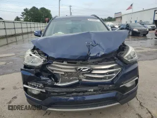 2018 Hyundai Santa Fe 2.4L z VIN 5XYZU3LB2JG537457, wystawiony jako Copart lot #56800005 z przebiegiem 97 344 mil mil oraz Szkoda całkowita • Salvage title. Historia ofert i sprzedaży dostępna na DreamBid. Obrazek 5.