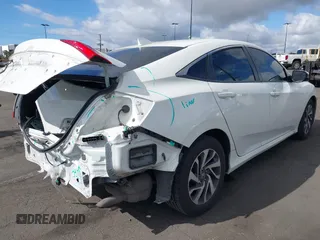 2017 Honda Civic Sedan EX with VIN 2HGFC2F7XHH553801, listed as a IAAI auction lot 41910095 with 104,962 mi miles. Bid and sale history available at carsss.com. Image 4.