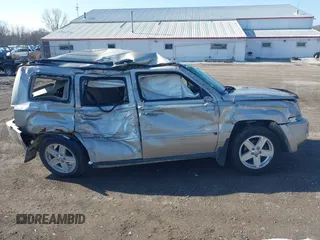 2010 Jeep Patriot Sport with VIN 1J4NF1GBXAD640562, listed as a IAAI auction lot 41869559 with 141,581 mi miles and . Bid and sale history available at DreamBid. Image 13.