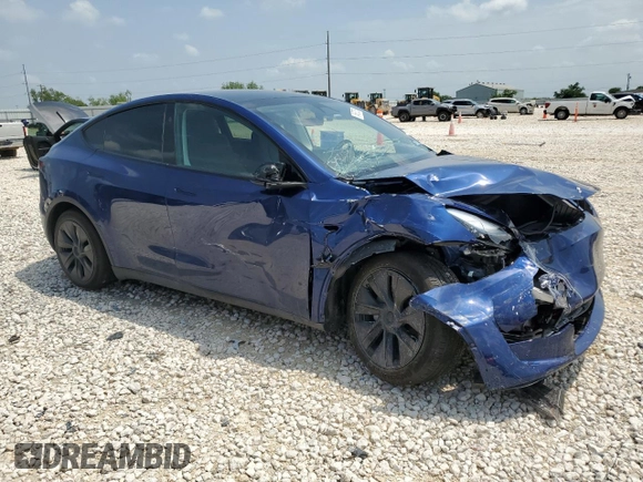 2024 Tesla Model Y Long Range with VIN 7SAYGAEE6RF196245, listed as a Copart auction lot 54667765 with 10,336 mi miles and Salvage title. Bid and sale history available at DreamBid. Image 4.