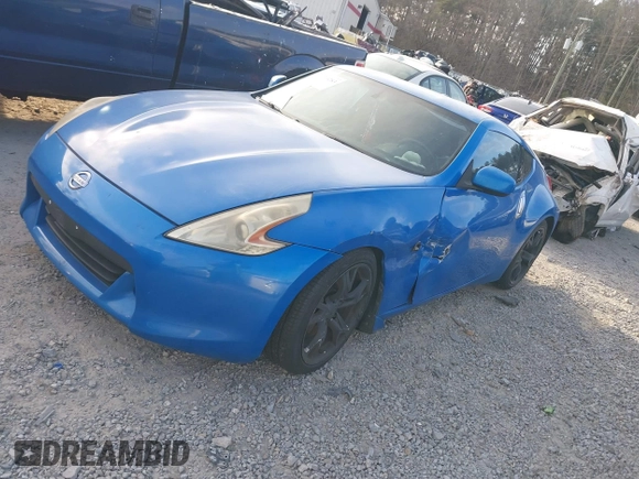 2009 Nissan 370Z Touring with VIN JN1AZ44E39M400201, listed as a IAAI auction lot 41710283 with 245,735 mi miles and . Bid and sale history available at DreamBid. Image 2.